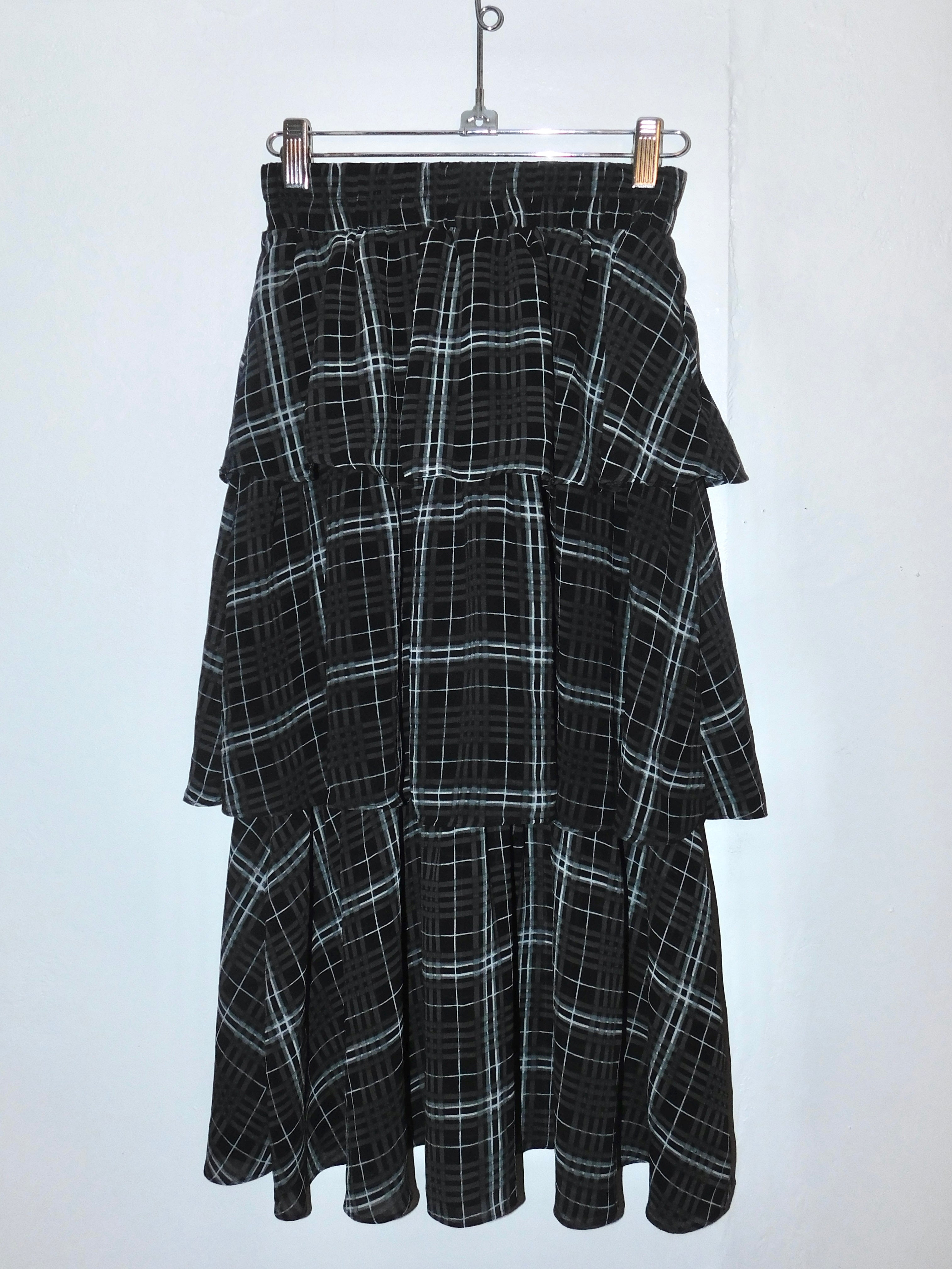 long flowy plaid skirt